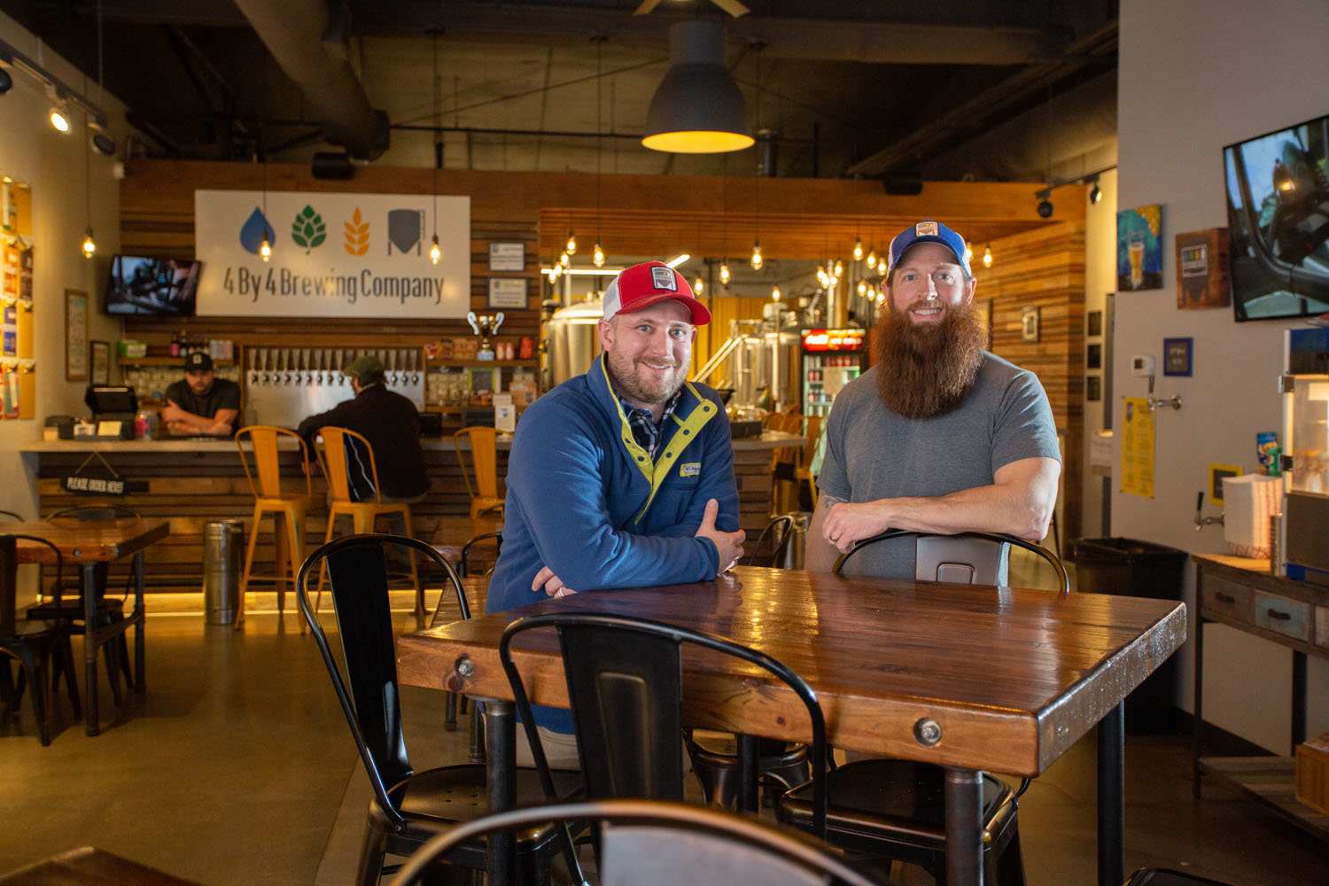 BREWING BUSINESS: Derek Shimeall, left, Chris Shaffer and the 4 By 4 Brewing Co. ownership group led the microbrewery to $800,000 in revenue last year.